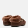 Moon Boot X Guest in Residence Evx Chalet Cocoa Mules i imitert pels Moon Boot X Guest in Residence Evx Chalet Cocoa Mules i imitert pels