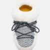 Moon Boot X Guest in Residence Evx Chalet White Sand Mules i imitert pels Moon Boot X Guest in Residence Evx Chalet White Sand Mules i imitert pels